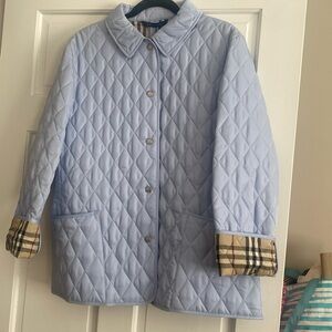 Authentic Burberry never used blue woman’s jacket.